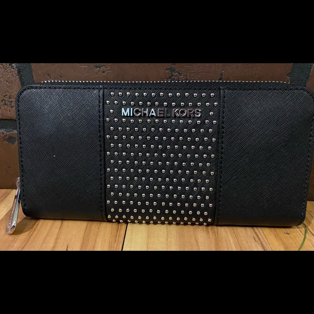 Michael Kors black zip around wallet with silver studding